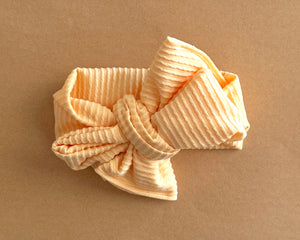 Oversized Bow Orange Cream Wavy Ribbed Tie On Headwrap