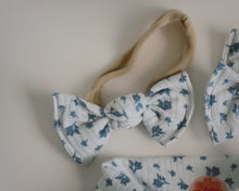 Floral patterned headbands on a light background