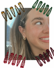 Woman with hair clips around her head, surrounded by various hair clips on a white background