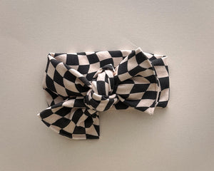 black wavy checker tie on headwrap bow for baby girl