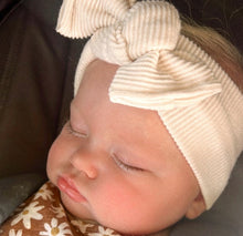baby girl in Headwrap bow stretchy and adjustable ivory ribbed neutral girl