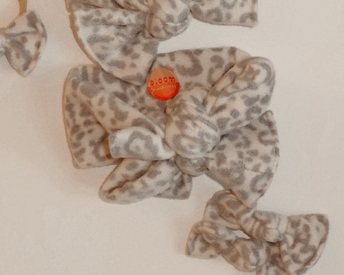oversized baby bow fuzzy leopard snow 