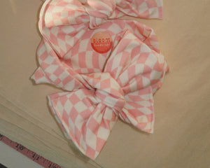 oversized bow baby girl wavy checker blush