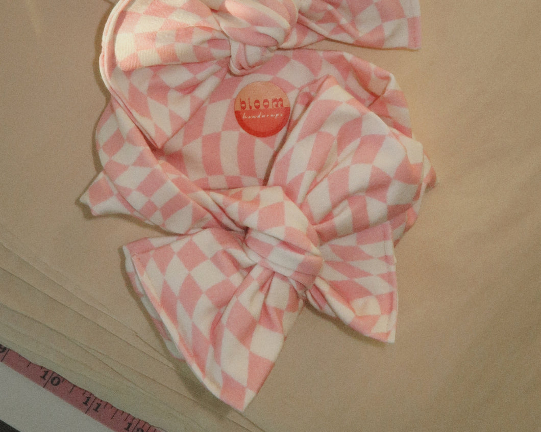 oversized bow baby girl wavy checker blush