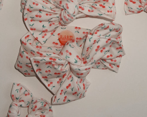oversized bow tie on headwrap bow for baby girl cherry print