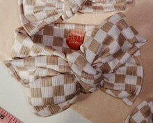 oversized tan checker tie on Headwrap bow for baby girl