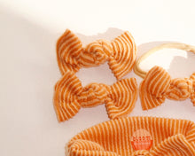 tangerine wavy ribbed bloom clips or nylon headband bows for baby girl
