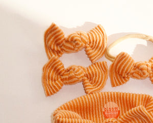 tangerine wavy ribbed bloom clips or nylon headband bows for baby girl